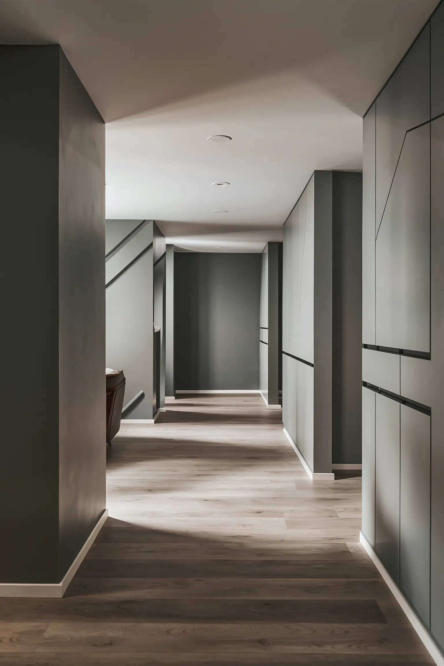 Minimalistic basement with stylish, budget-friendly laminate flooring.