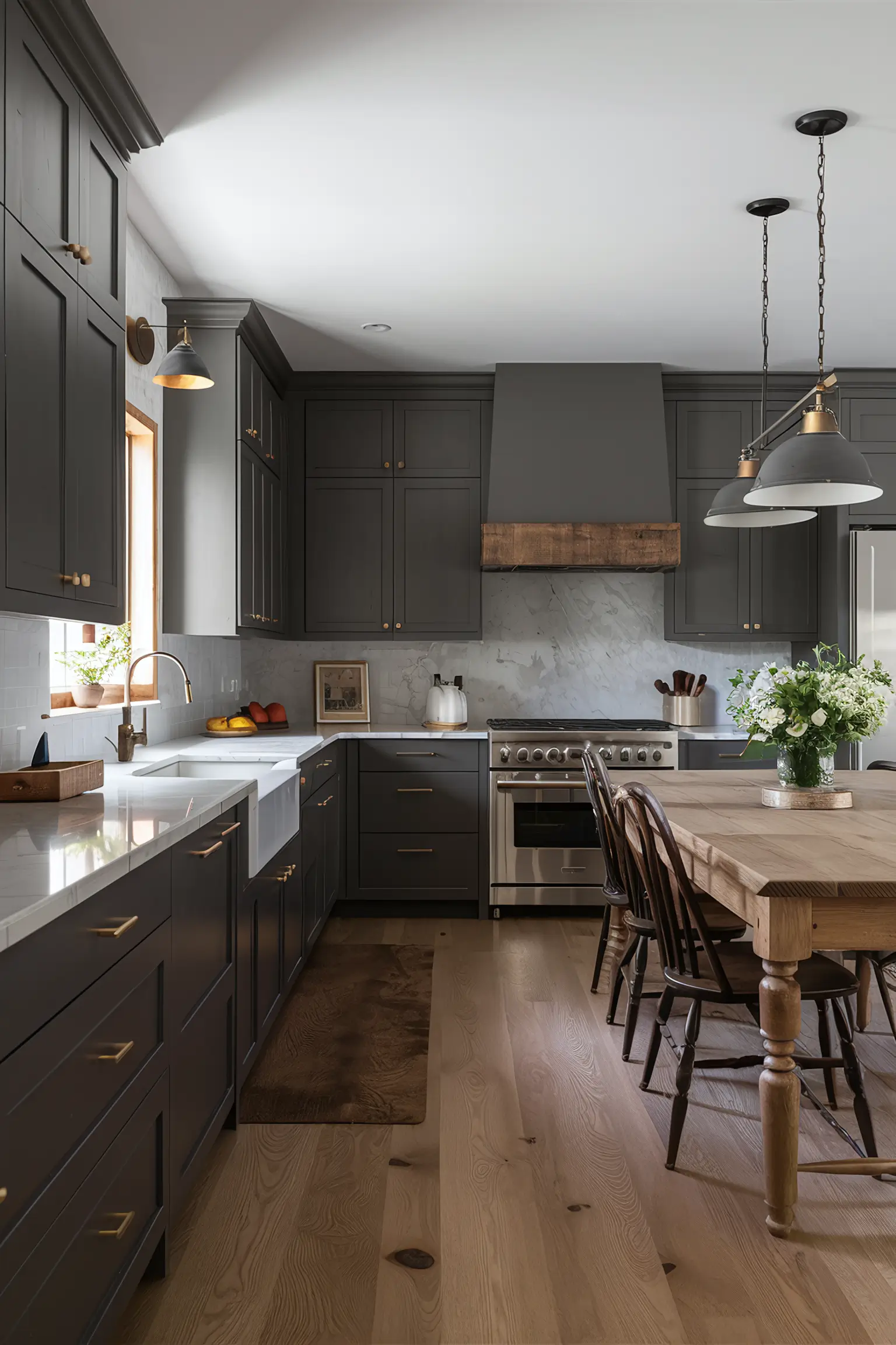 Minimalistic farmhouse kitchen with dark cabinets and rustic modern elements.