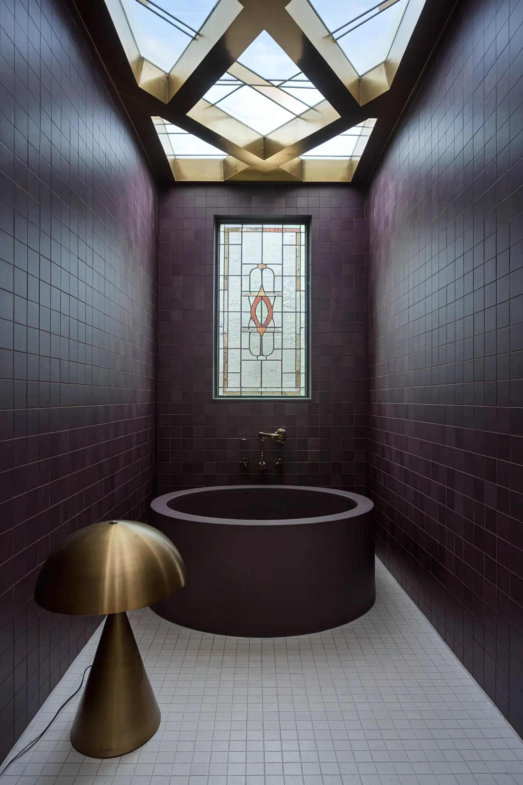 Show-stopping small luxury bathroom with standout design features and artistic elements.